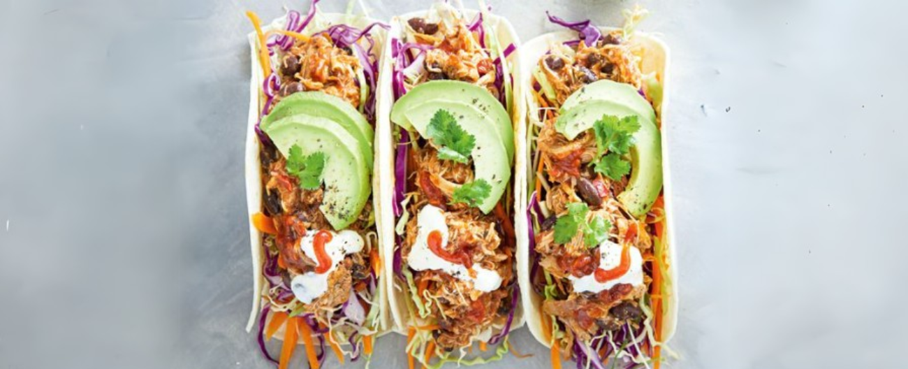 Three Slow Cooked Chicken Tacos, Garnished with Avocado